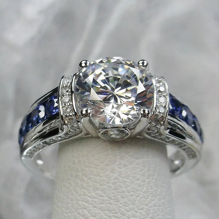 S925 Silver Round‑Cut Diamond Ring With Blue Gem Inlaid Band
