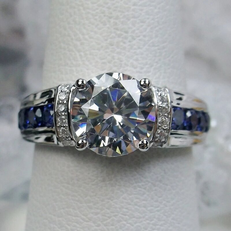 S925 Silver Round‑Cut Diamond Ring With Blue Gem Inlaid Band