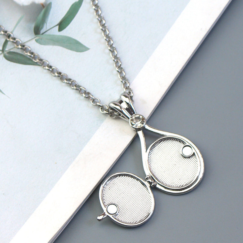 Magnetic flip-top shell necklace with diamond-encrusted mermaid design