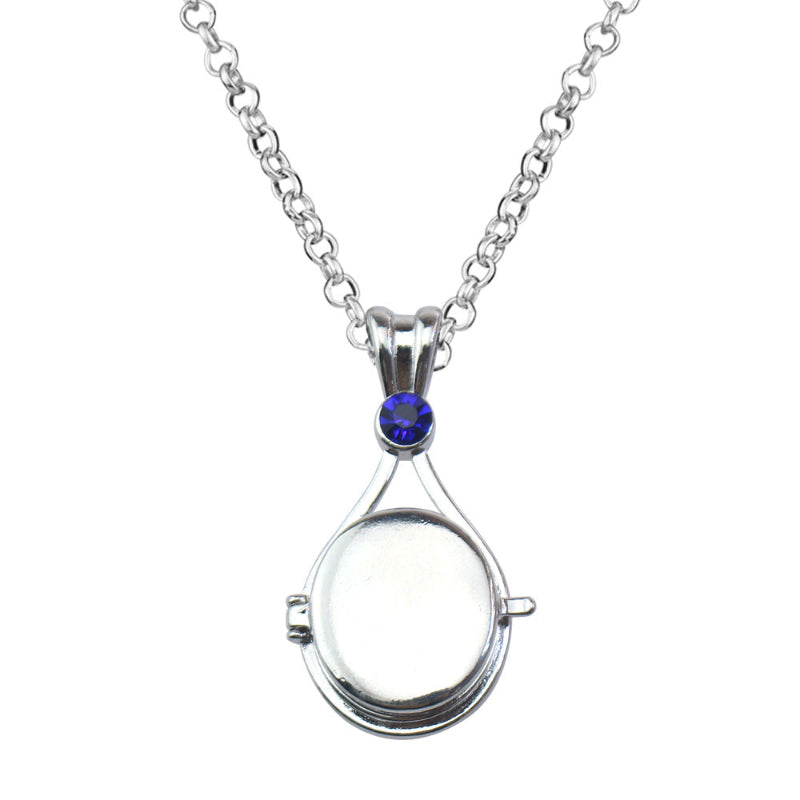 Magnetic flip-top shell necklace with diamond-encrusted mermaid design