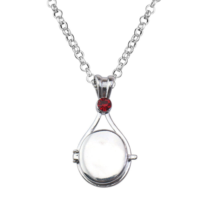 Magnetic flip-top shell necklace with diamond-encrusted mermaid design
