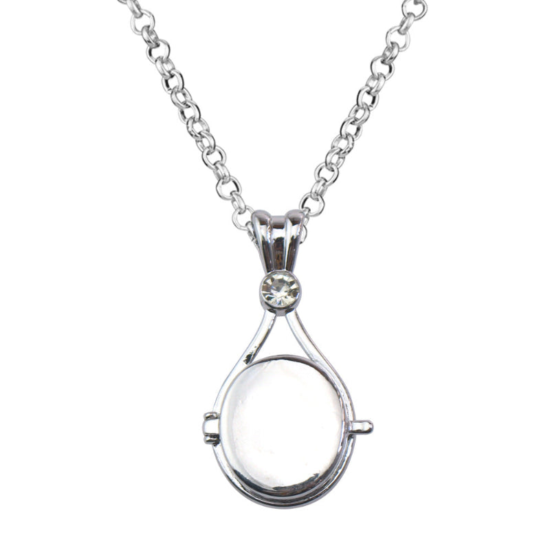 Magnetic flip-top shell necklace with diamond-encrusted mermaid design