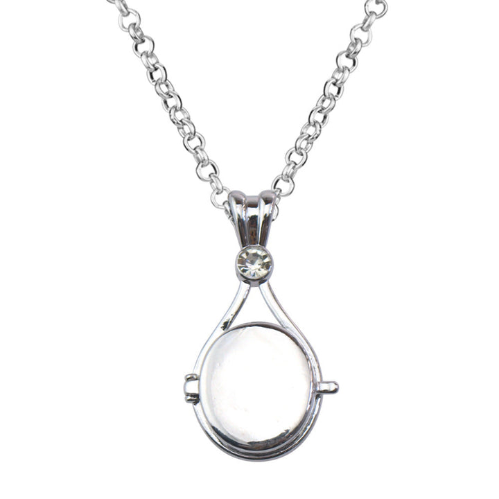 Magnetic flip-top shell necklace with diamond-encrusted mermaid design